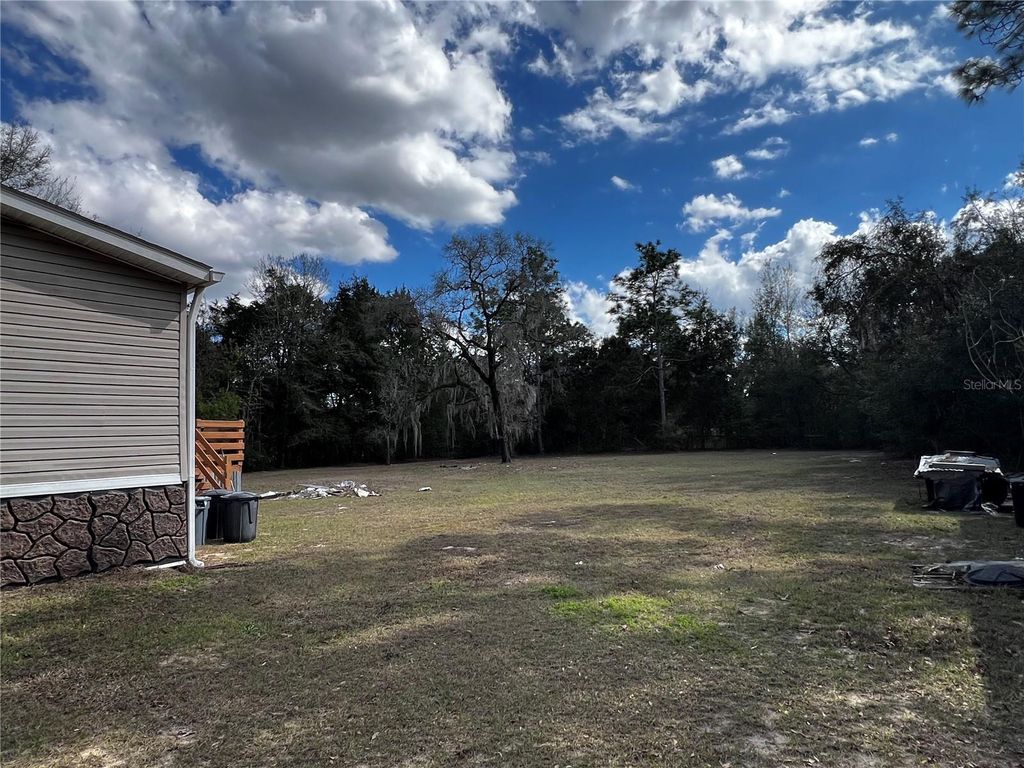 Photo of 6146 W Heritage Drive, Homosassa, FL 34448 (MLS # W7883543)