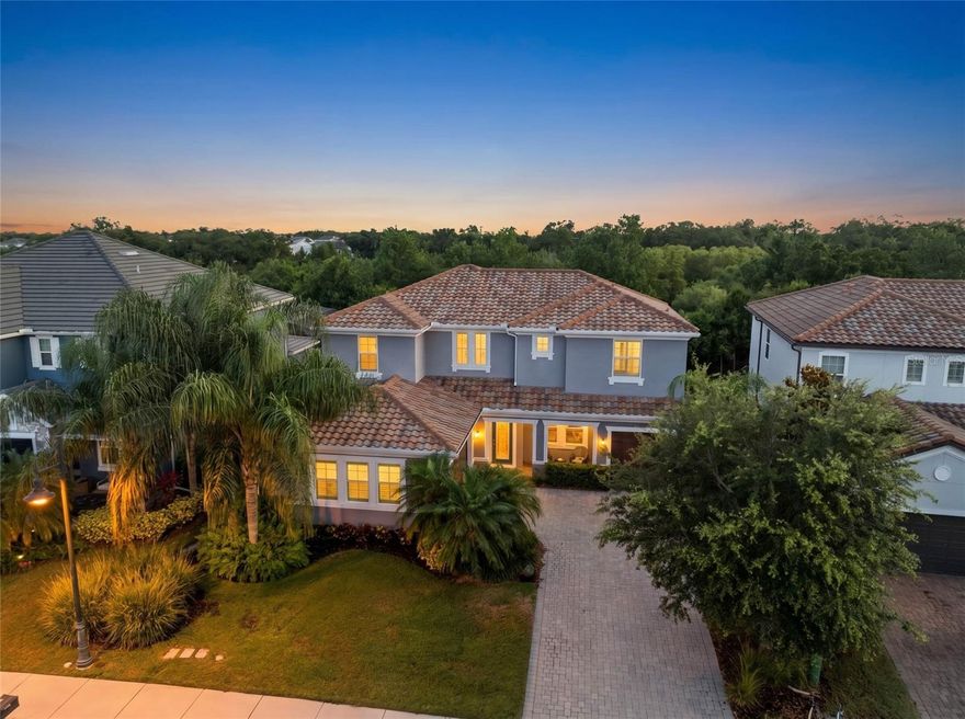 Perfectly positioned on a quiet cul-de-sac within the gated community of Arbor Grande in Lakewood Ranch, this custom-built CalAtlantic residence features Hurricane impact windows, a whole house generator, Flood Zone X location, new Bosch appliances, and meticulously maintained interiors. These upgrades immediately set this residence apart from the rest while offering the security, quality, and comfort buyers value most. Situated on an oversized preserve homesite near Bob Gardner Park and top-rated schools, this beautifully refreshed home offers exceptional privacy, thoughtful upgrades, and a move-in ready lifestyle in one of the area’s most sought-after communities. Custom built in 2017 and thoughtfully and extensively updated in 2025, this expansive home spans over 3,500 square feet with 4 bedrooms, 4 full bathrooms, a private office, and a spacious 3 car side-entry garage. A dramatic two-story foyer with soaring 20-foot ceilings creates an impressive arrival, while expansive open living spaces filled with natural light are designed for both elevated entertaining and comfortable everyday living. At the heart of the home, the chef’s kitchen is beautifully appointed with new Bosch appliances including a gas cooktop and French door refrigerator, an oversized quartz island, Timberlake cabinetry, and a generous walk-in pantry designed for both function and gathering. Recent upgrades throughout the home include Sherwin Williams Emerald interior paint, luxury carpeting, Kohler light fixtures, updated plumbing fixtures, new bathroom quartz countertops, Toto toilets, Minka Aire ceiling fans, an ADT security system, and a Culligan water filtration system, all contributing to the home’s elevated yet comfortable feel. Designed to embrace indoor-outdoor Florida living, the home features two covered and screened lanais, one on each level, overlooking a tranquil preserve backdrop that offers exceptional privacy. The expansive backyard provides ample space to create a custom outdoor oasis while still enjoying the peaceful natural setting. Residents of Arbor Grande enjoy resort-style amenities including a junior Olympic saltwater beach-entry pool, a 10,000-square-foot clubhouse, fitness center, bocce courts, and private gated access to the scenic trails and green space of Bob Gardner Park. Lawn care and irrigation are included through the HOA, creating a low-maintenance lifestyle just minutes from top-rated schools, championship golf, University Town Center, downtown Sarasota, and the Gulf Coast beaches of Siesta Key, Lido Key, and Anna Maria Island.