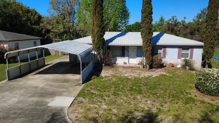 Investor special! 3 bedroom 2 bath home with over 1,000 square feet of living space on a spacious quarter acre lot. Major updates already completed including a metal roof a brand new HVAC system installed last year, and an updated electrical panel installed last year giving buyers confidence in some of the home’s most important components. The property also features both a garage and a carport for ample parking and storage. The fenced backyard offers privacy and plenty of room for pets, gardening, or outdoor entertaining. Enjoy the back porch for relaxing evenings plus a rear storage area for added convenience. Great opportunity for an investor or a family ready to add some TLC and create a wonderful home with solid upgrades already in place.