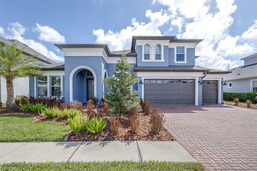 Welcome to a home that truly sets the standard for luxury living. Perfectly positioned on a private conservation lot with breathtaking panoramic views, this exceptional residence in the gated enclave of Silvercreek at Watergrass offers high-end design, extensive upgrades, and resort-style outdoor living.
Inside, 12-foot ceilings, 8-foot doors, tray ceilings, crown molding, and fresh 2026 interior and trim paint create a bright, sophisticated feel throughout. The open layout is ideal for both everyday living and entertaining, enhanced by a whole-home interior and exterior speaker system.
The beautifully updated kitchen features 42-inch cabinetry with crown molding and soft-close doors, granite countertops, a new designer backsplash, and brand-new dishwasher. Reverse osmosis water filtration (2026) adds convenience and quality.
The primary suite is a true retreat, featuring tray ceilings, his-and-her closets with built-ins, and a spa-inspired bathroom with a garden tub, walk-in shower, and private water closet. A standout feature is the enclosed office within the primary suite, complete with elegant glass French doors, perfect for working from home.
Step through the pocket sliding glass doors and discover what truly makes this home unforgettable: a resort-caliber outdoor living space. The extended covered lanai overlooks a stunning solar-heated, salt and chlorine pool with Pentair lighting, self-cleaning system, and safety fence. Travertine pavers, a brand-new gazebo (2026), and a fully equipped outdoor kitchen with built-in propane grill, bar seating, storage, sink, and refrigerator create the ultimate setting for entertaining. Electrical connections for an outdoor TV make this space game-day ready.
Major updates in 2026 include a new roof, new HVAC with Ecobee smart thermostat (transferable warranty), and new insulation, along with a 2021 water heater, whole-home water softener, and owned Tesla solar panels. The garage features epoxy floors, built-in organization, and an EV hookup.
Residents enjoy the amenities of Watergrass, including three pools, splash pad, clubhouse, fitness center, tennis courts, parks, playgrounds, dog park, and miles of sidewalks. Conveniently located near Interstate 75 for easy access to Tampa, the Suncoast Beaches, and Orlando.
This isn't just a home, it's a rare opportunity to own a property that truly has it all.