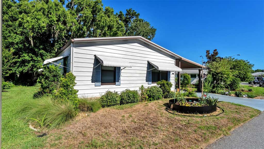 Photo of 4959 Colonnades Circle W, Lakeland, FL 33811 (MLS # L4962567)