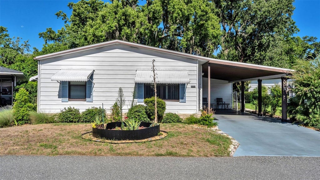 Photo of 4959 Colonnades Circle W, Lakeland, FL 33811 (MLS # L4962567)