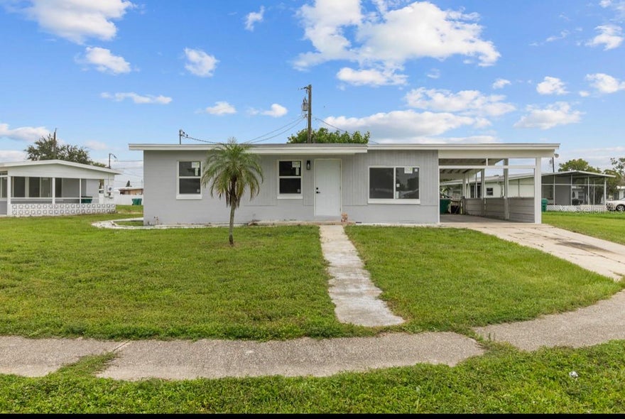 Freshly renovated and move-in ready! This charming 3-bedroom, 2-bath home provides over 1,100 square feet of comfortable living space in the heart of Port Charlotte. Recently updated throughout, the home features durable vinyl flooring, a bright and functional layout, and a well-equipped kitchen with a cooktop, microwave, and refrigerator. Washer and dryer are included for added convenience.

Enjoy the convenience of an attached carport, a spacious lot, and a central location close to shopping, dining, schools, medical facilities, and everyday amenities. The landlord is motivated and provides flexible lease terms, making this an excellent opportunity for tenants seeking a clean, updated home in a desirable area.