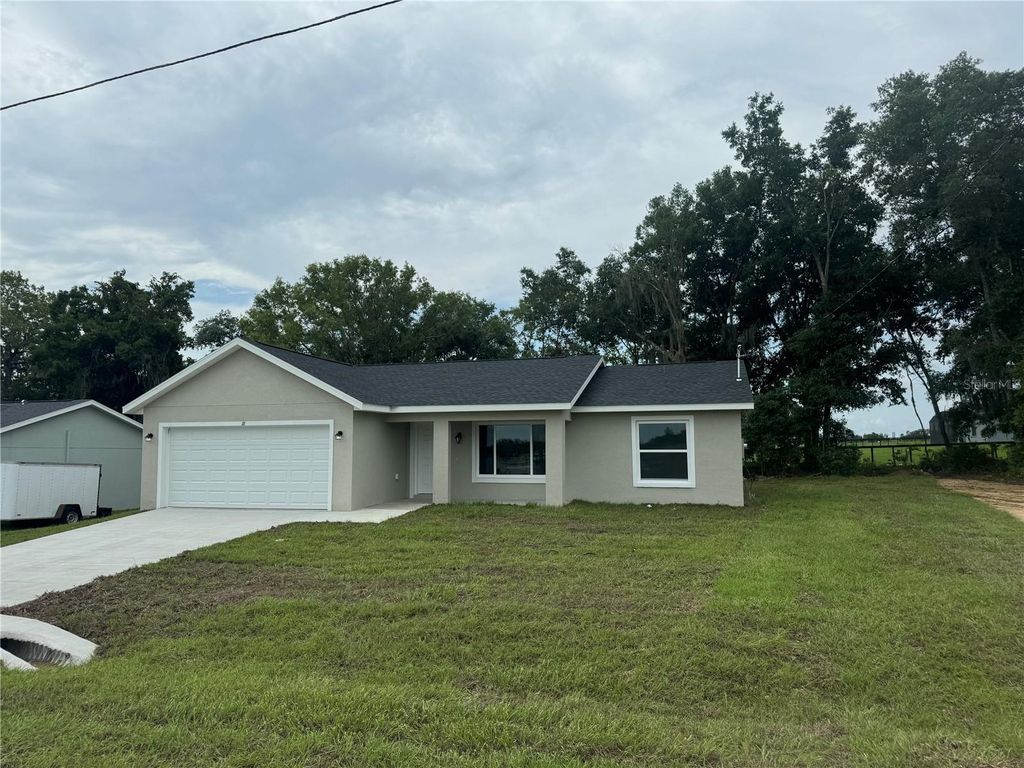 Photo of 18 Maple Lane, Ocklawaha, FL 32179 (MLS # O6344096)