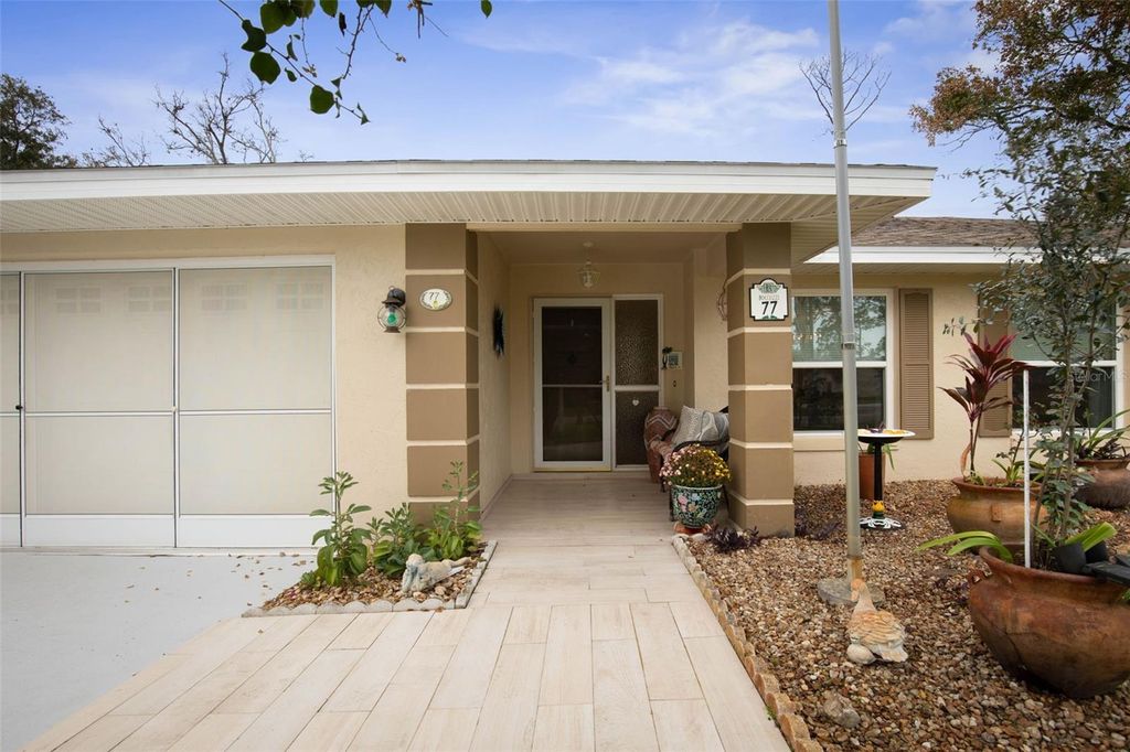 Photo of 77 Westover Lane, Palm Coast, FL 32164 (MLS # FC314348)