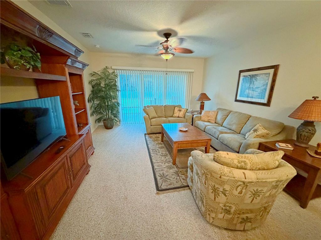 Photo of 1100 Canopy Walk Ln #1112, Palm Coast, FL 32137 (MLS # FC314773)