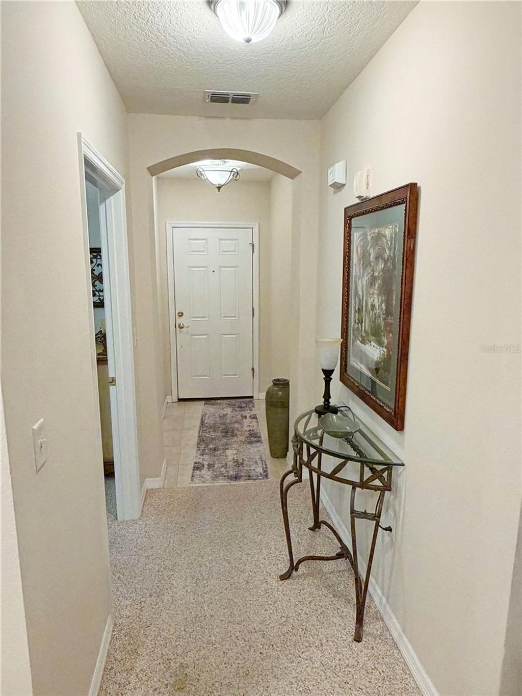 Photo of 1100 Canopy Walk Ln #1112, Palm Coast, FL 32137 (MLS # FC314773)