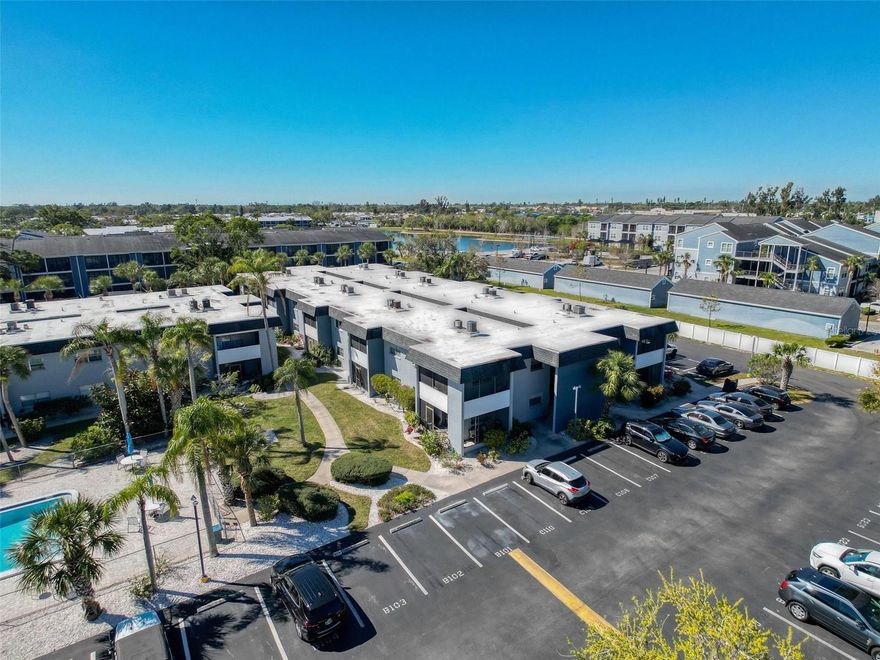 Motivated Seller...Fully Renovated 2BR/2BA Corner Unit – Exceptional Style, Comfort & Location
Presenting a beautifully renovated second-floor corner unit condominium offering 2 bedrooms, 2 bathrooms, and a host of premium upgrades designed for modern living. This standout residence features a brand-new A/C system (2024) to ensure year-round comfort and energy efficiency.  As one of the only units in the community equipped with an in-unit washer and dryer combo (2024), this property offers a rare level of convenience and value.  Step inside to discover a bright, inviting interior highlighted by wide-plank laminate flooring, fresh finishes, and abundant natural light throughout. The chef-inspired kitchen boasts stainless steel appliances, granite countertops, and ample cabinetry—perfectly appointed for both functionality and style.  A spacious wraparound screened balcony extends the living space and provides a tranquil setting to enjoy Florida’s indoor-outdoor lifestyle.  Professionally managed and meticulously maintained, this community offers residents a relaxed, amenity-rich environment. Take advantage of poolside grilling stations, assigned parking, and 24-hour access to the onsite laundry facility.
Comprehensive HOA fees include:
Cable TV, Internet, Water, Sewer, Trash, Escrow Reserves, Roof, Building Insurance, Common Area Taxes, Fidelity Bond, Grounds Maintenance, Pool Maintenance, Building Maintenance, and Professional Management—ensuring peace of mind and exceptional value.

Prime Location:
Ideally situated within one mile of major retail and dining, just minutes from local Farmers Markets and only a short drive to some of Florida’s most beautiful Gulf Coast beaches.

This move-in-ready condo is ideal for primary residents or seasonal homeowners,