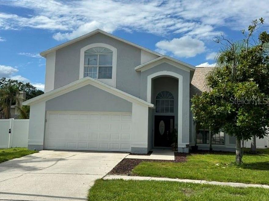 Welcome home! This spacious 3 bedroom 2.5 bath home with large loft overlooking the first floor and dramatic 2 story entry is waiting for you! NO CDD!! As you enter this incredible home, you are greeted with volume ceilings and a beautiful wooden staircase with railings cascading across the second level. Loft could easily be converted to a 4th bedroom or used as an office/den/game room. Your private fenced back yard opens to a HUGE screen enclosed private pool with paver decking, PebbleSheen finish, SAMS light, and your own waterfall! Beautiful renovations include both upstairs bathrooms remodeled with all Quartz counters, upgraded baseboards and NuCore Luxury Vinyl flooring for the whole 2nd floor including all the bedrooms! The homes interior was painted in 2025, exterior in 2026, the ac replaced in 2026, the roof was replaced in July 2024, has separate irrigation meter and with the newer water heater you will have peace of mind knowing that the big ticket items have been done for you!! If that wasn't enough, the home is zoned for Strawberry Crest and is Close to I-4, shopping and everything. Call today; don't let this one get away!