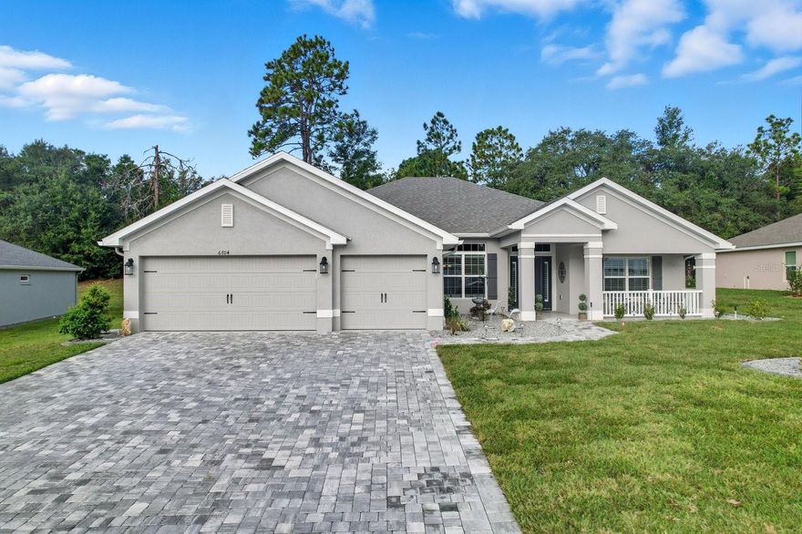 Welcome Home to your elegant 4-bedroom, 3-bath, 3-car garage home nestled in the premier Juliette Falls golf community in Dunnellon. 
This residence features a modern open floor plan with spacious main living areas, ideal for entertaining and everyday living. The kitchen includes ample counter space and cabinetry. The primary suite provides privacy and comfort with an en suite bath and generous closet space. Two additional guest bedrooms share well-appointed bathrooms.
Quality construction and attention to detail are evident throughout: durable upgraded finishes, neutral palette, and thoughtful layout. Outside, the property includes a manicured yard, screened in porch with a peaceful wooded view and is part of a community with scenic golf course views and neighborhood amenities.
Conveniently located near Rainbow Springs, the Withlacoochee River, local shopping, dining, and recreation, this home offers the perfect balance of lifestyle and location.