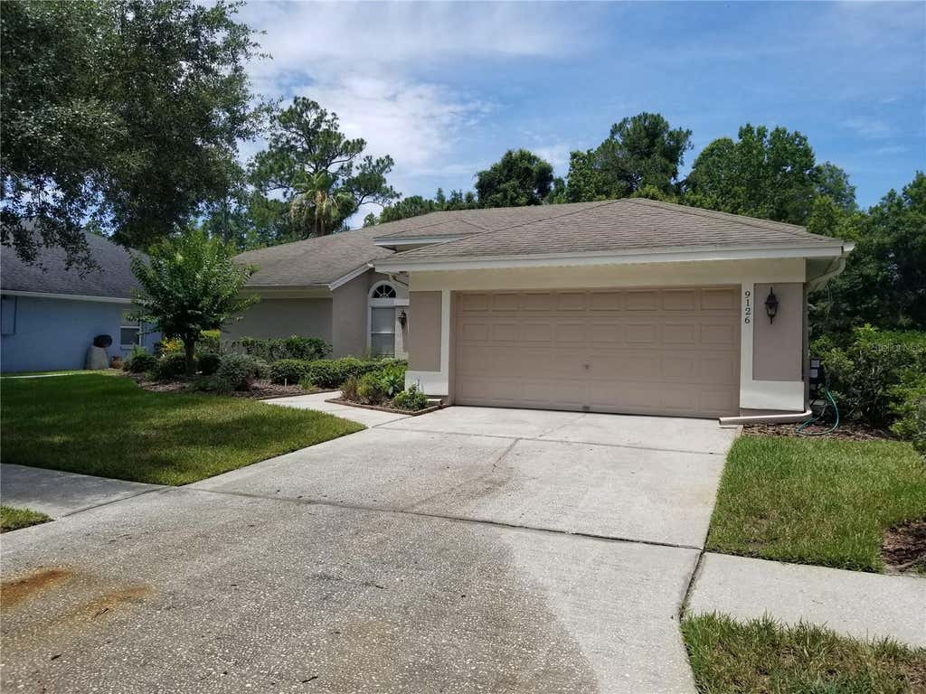 Photo of 9126 Rockrose Drive, Tampa, FL 33647 (MLS # TB8516732)