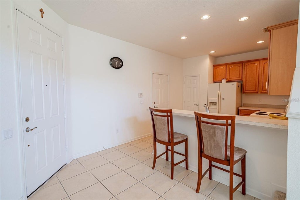 Photo of 1605 Shallcross Avenue, Orlando, FL 32828 (MLS # O6446636)