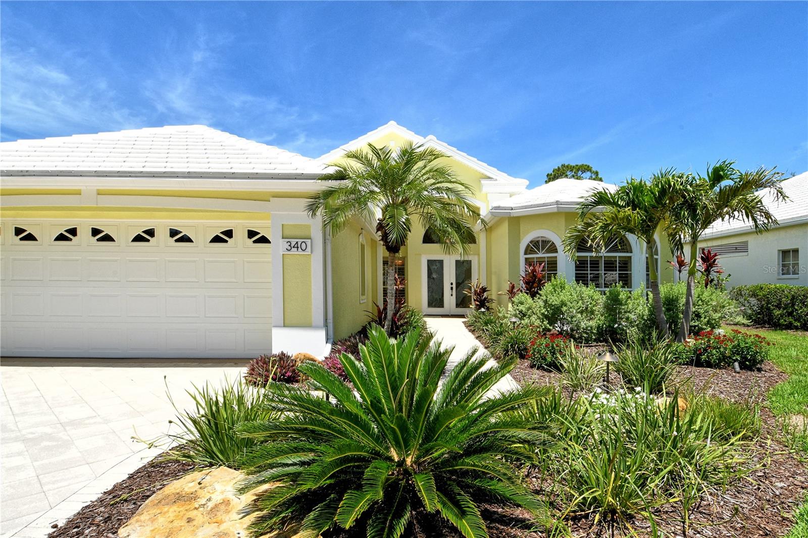 This beautiful MAINTENANCE FREE pool home sits right on the 2nd hole of the Plantation Golf & CC Bobcat course and has been lovingly cared for and recently refreshed throughout. Live close to Wellen Park but WITHOUT A CDD FEE! FRESH PAINT, NEW PLANTATION SHUTTERS, UPDATED LIGHTING, and brand-new LANDSCAPING (2024) give it a clean, modern feel from the start.
The fully REDONE POOL AREA (2024) is a true highlight—featuring sparkling glass tile, a relaxing spa and fountain, newer pool pump, and reconditioned heater. Whether you're lounging in the in-pool bar seats, cooking in the outdoor kitchen, or catching the game under the retractable awning, this space was made for enjoying the Florida lifestyle.
Inside, the open living and dining areas offer great natural light and GOLF COURSE VIEWS. The spacious primary suite has direct pool access and a large ensuite with jetted tub, walk-in shower, double sinks, and a big walk-in closet.
All bedrooms feature new (2025) antimicrobial carpet. The third bedroom offers flexibility for an office or guest room. The kitchen is bright and functional with a wine rack, under-cabinet lighting, reverse osmosis system, and a built-in banquette with storage.
You'll also love the versatile extra space that works great as a butler’s pantry, mudroom, or home office. The two-car garage offers plenty of storage, plus attic access.
***An ELECTRIC HURRICANE SCREEN offers peace of mind and doubles as a sunshade for added comfort.***
This home was treasured by its previous owners, and it shows. Come see for yourself why life at The Plantation is so special—friendly neighbors, great amenities, and a place you’ll be proud to call home.