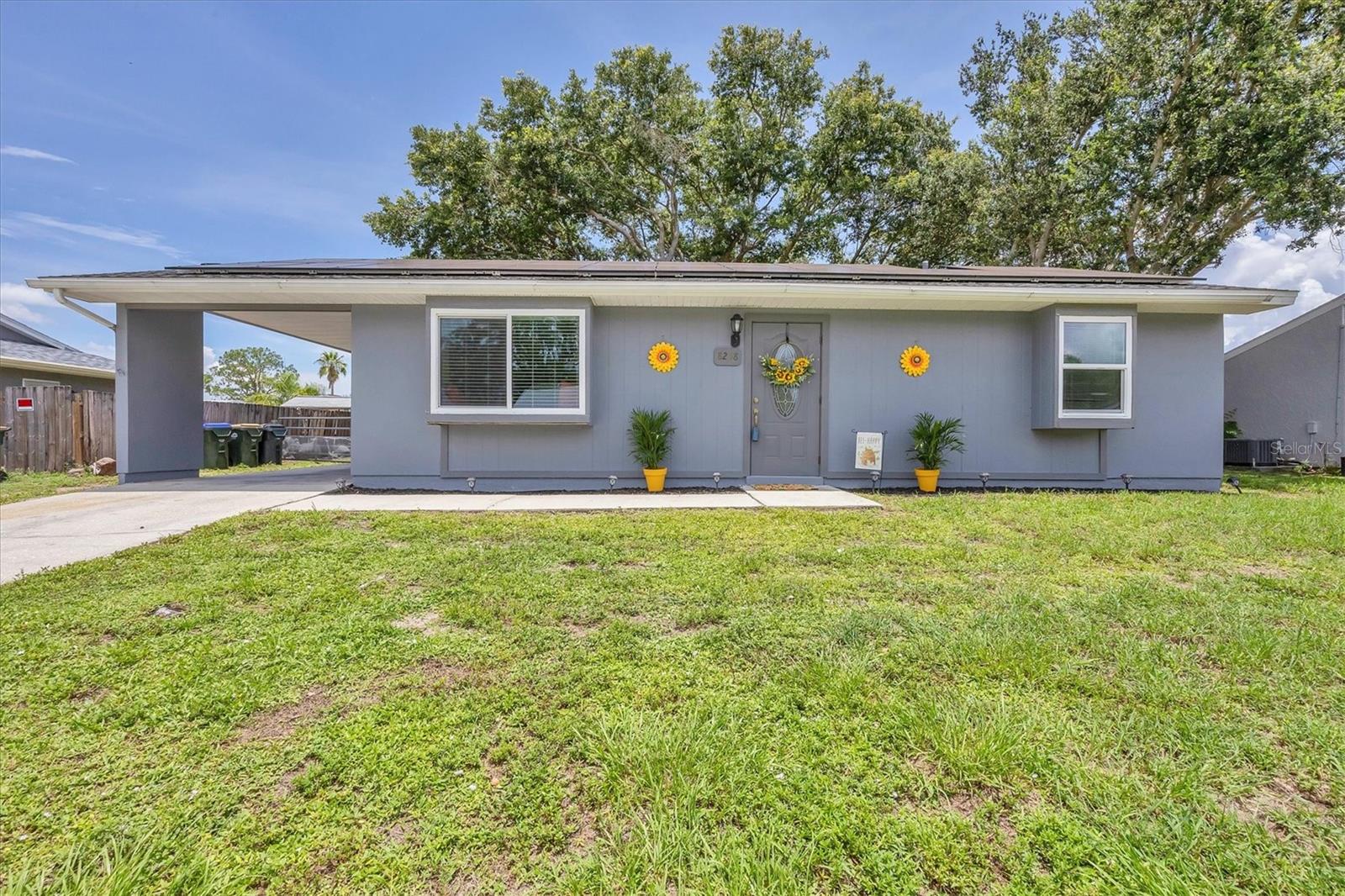 How does a $30 a month electric bill sound? This home has whole house solar, installed 2022 at a cost of $39K, balance will be paid in full by seller at closing. DON’T LET THE SMALLER SQUARE FOOTAGE DISCOURAGE YOU; IT FEELS MUCH BIGGER WITH A GREAT FLOORPLAN. The home is on city water and sewer unlike a great deal of North Port. The roof, A/C, and electric are all in working order and updated in the past 10 years. The front door has been replaced as well as some of the windows. The interior has fresh paint and updated bathrooms. Plenty of closet space in the bedrooms with laminate wood flooring. There is a large open back porch that overlooks beautiful oak trees, a perfect spot to create a private oasis or space for the kids to play in the shade. A large shed is included and it is outfitted for power. Plenty of space in the side yard for a RV or boat. Bring your personal touch and enjoy many years as the seller has. NOT IN A FLOOD ZONE!!!
