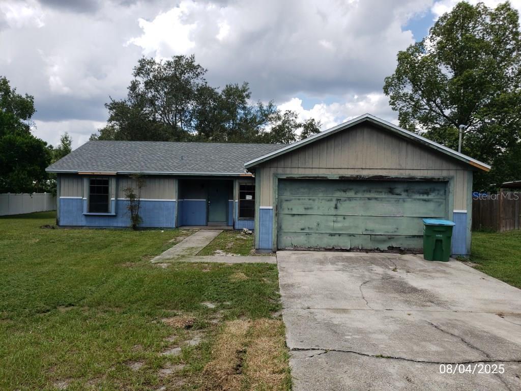 ***GREAT OPPORTUNITY*** Diamond in the rough with a BRAND-NEW ROOF. Three bedroom home with two full baths, two car garage on a large lot. New roof installed June 2025. So many ways for investors or DIY to make your vision a reality