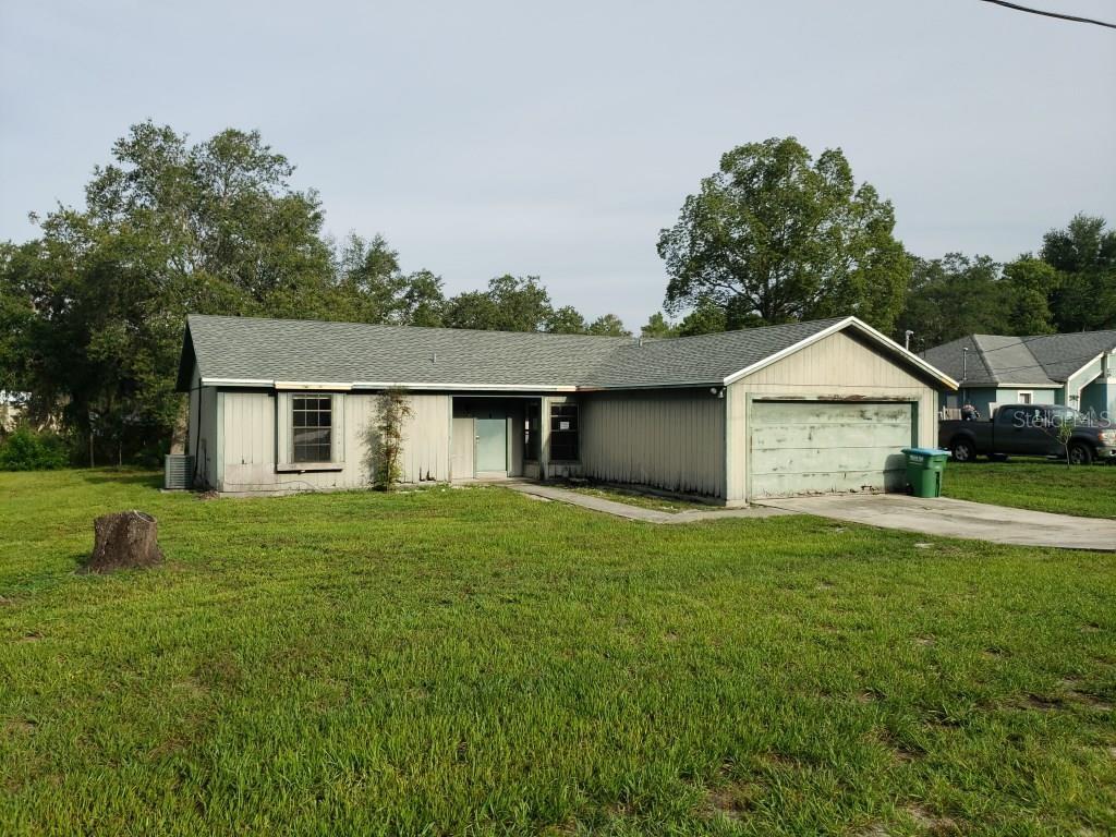 ***GREAT OPPORTUNITY*** Diamond in the rough with a BRAND-NEW ROOF. Three bedroom home with two full baths, two car garage on a large lot. New roof installed June 2025. So many ways for investors or DIY to make your vision a reality