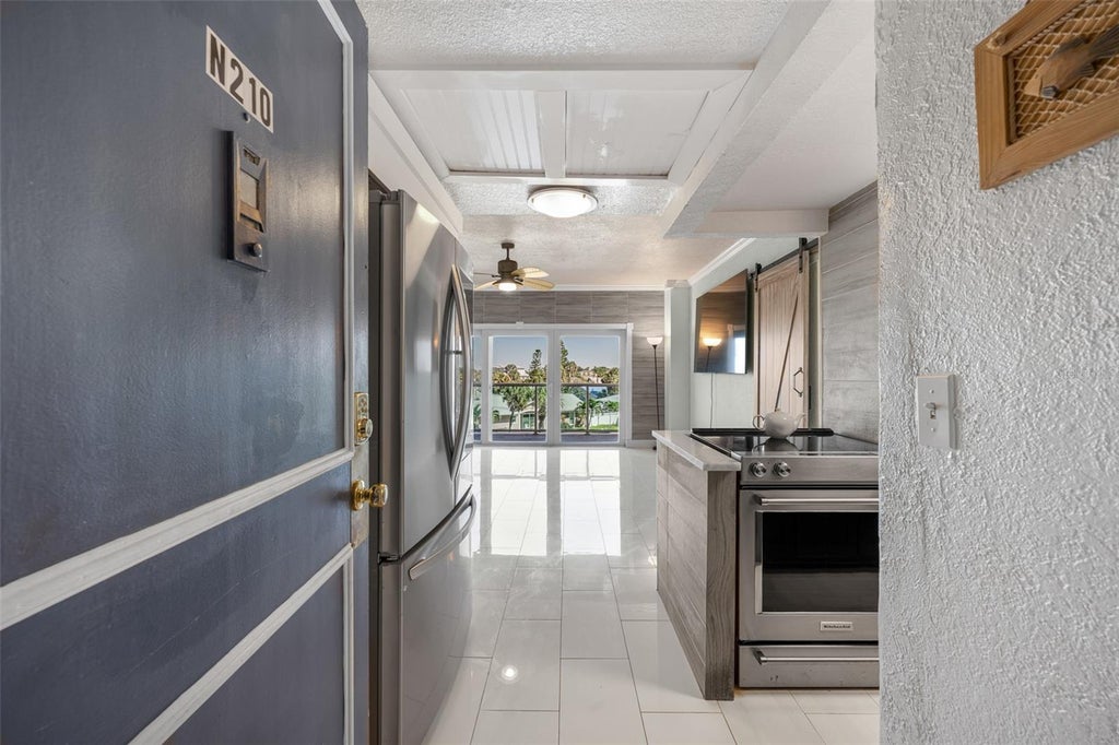 Photo of 880 Mandalay Avenue #N210, Clearwater, FL 33767 (MLS # TB8559851)
