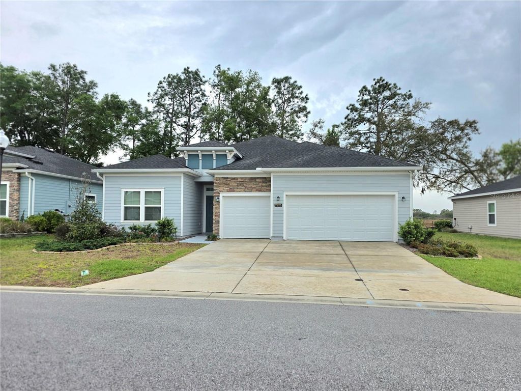 Photo of 7875 SW 74th Loop, Ocala, FL 34481 (MLS # OM723350)