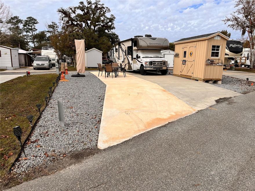 Fantastic double width poured drive through lot. Comes with shed. Escape to the Great Outdoors but just minutes to downtown Silver Springs. Come and enjoy Wilderness RV Resort. 55+ magnificent river front community. Come enjoy all Ocala has to offer. 55+ Oasis awaits you. This is a 55+, however if you are not 55yrs old you can still buy in here. You just can't live in it permanently. But you can rent it out when you are not enjoying it for yourself. Can be used for short and /or long-term rental makes this property a great income producing property. It feels like you are out in the middle of wilderness with the river and the forest. But jump on Hwy 40 and go just 7 miles and everything you want is there. Enjoy the day kayaking from Silver Springs Park take the river downstream you can pull your kayak out here at the resort. There are Jeep trails minutes away. Fine dining and all that historic downtown Ocala has to offer is just minutes away. Kid Friendly 2 weeks at a time are allowed. There is so much to do Kayaking, walking trails, community Pool and many more amenities are offered within the community, Located near multiple state parks such as Silver Springs, Juniper Springs, Salt Springs, Museums, Nature trails. Come and enjoy nature at its finest.