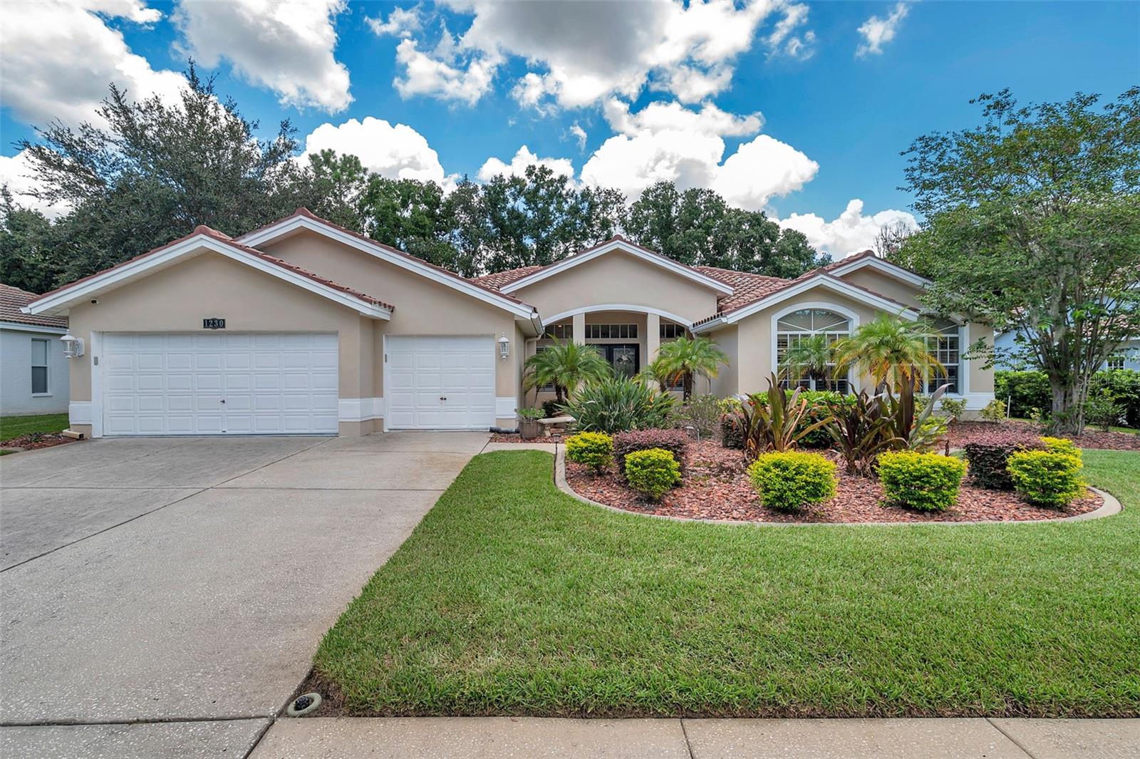 Welcome to this executive style 4 Bedroom, 3 Bath, 3 Car Garage Pool Home in the Gated Community of Crescent Oaks Golf & Tennis Club! This home is located on the 14th Hole with awesome views from the back lanai -pool area. It has a beautiful large Glass Double Door Entry to the Foyer with a great view to the pool area and the Open Floor Plan. The large Kitchen features Granite Countertops, Stainless Steel Appliances, Glass Top Range, Working Desk and Large Breakfast Bar. The Master Suite features a Private En-Suite Bath plus an oversized Walk-in Closet with custom shelving . The Master Bath has Dual Sinks, Granite Countertops, Soaking Tub & Glass Step-in Shower with brand new shower doors. This home has a split bedroom design with two of the Bedrooms on one side of the home that share a Guest Bath that features a Granite Countertop, Dual Sinks and Tub/Shower. The 4th Bedroom is currently used as an office with Built Ins. There is a 3rd Full Pool Bath located on Lanai for convenience to the pool. You can't beat the Sparkling Pool with the Gorgeous Views of the golf course! The screened in lanai has 2 covered areas that is great for entertaining. It is in a great location that is minutes to shopping, restaurants, County Parks & Trails, County Beaches & Top Rated Schools. The tile Roof was replaced in 2012, and the energy efficient HVAC system was just replaced in 2023.