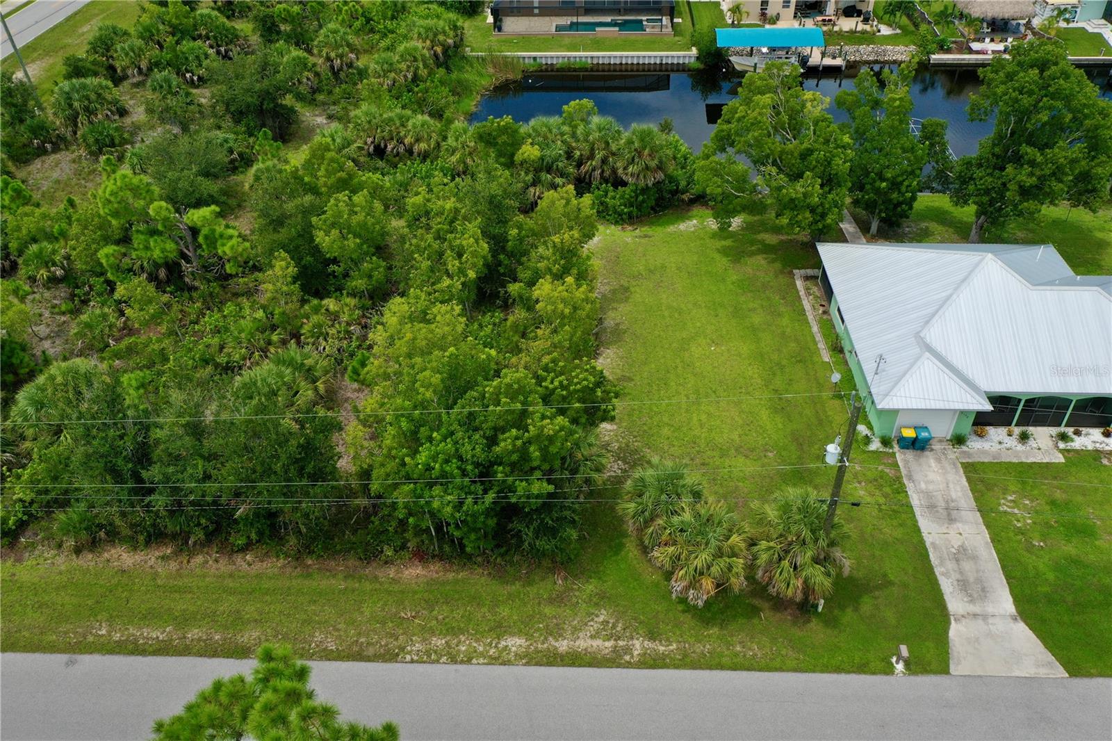Prime location for this 80 x 125 buildable, canal lot, with Gulf access in the premier boating community of South Gulf Cove. Build your dream home on this property that has great sunset views because of its east/west positioning on the canal! Optional $75 HOA & optional Yacht club to belong to. County sewer, county water, recreation center, parks, and boat ramp are just a few features of this community. Nearby to the pristine beaches of Boca Grande, Englewood Beach, and Manasota Key beaches. Near shopping, schools, churches and area attractions. The Charlotte Sports Complex, spring training camp for the Tampa Ray's and home to the Charlotte Stone Crabs, is only 15 minutes away.