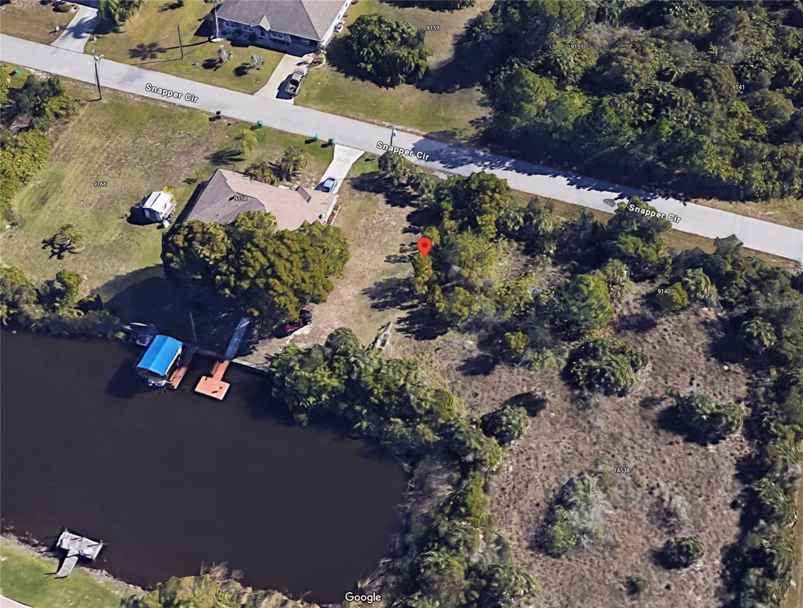 Prime location for this 80 x 125 buildable, canal lot, with Gulf access in the premier boating community of South Gulf Cove. Build your dream home on this property that has great sunset views because of its east/west positioning on the canal! Optional $75 HOA & optional Yacht club to belong to. County sewer, county water, recreation center, parks, and boat ramp are just a few features of this community. Nearby to the pristine beaches of Boca Grande, Englewood Beach, and Manasota Key beaches. Near shopping, schools, churches and area attractions. The Charlotte Sports Complex, spring training camp for the Tampa Ray's and home to the Charlotte Stone Crabs, is only 15 minutes away.