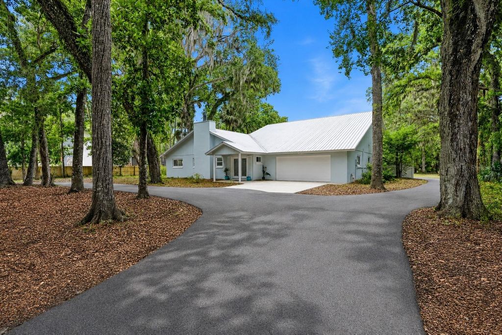 Photo of 555 Wildwood Drive, New Smyrna Beach, FL 32168 (MLS # NS1088196)