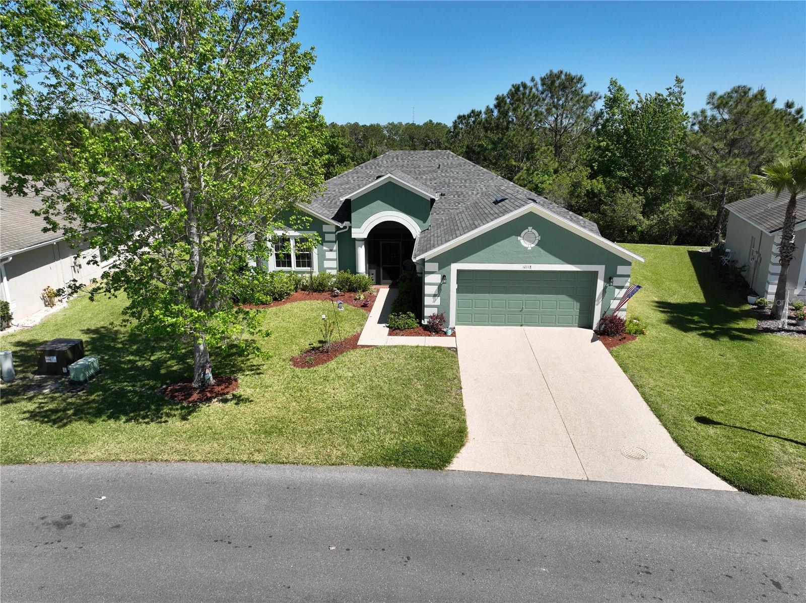 Stunning Home on a Private Conservation lot with a View of the Golf Course from the front. This move-in ready home is located in the highly desirable Gated, 55+ Community of Tampa Bay Golf and CC. NEW Roof in March 2023, Master Bath Remodeled in February 2022, Newer Double-Paned Windows, and A/C replaced in 2019. New 2022 Washer & Dryer, New 2023 Range. Enter the double front doors to an open living room/dining room combo with views of the covered screen lanai. Kitchen features granite counters, breakfast nook, and a large closet pantry. Master suite was remodeled with a beautiful tiled walk-in shower and dual sink vanity. From the front guest bedroom/office you can view golfers teeing off on hole 15. Furniture is negotiable. Come see this home today! HOA includes Lawn Care, Cable, Internet, and access to many amenities at Tampa Bay Golf and CC! Community features 2 swimming pools (one heated), a restaurant, pub, and executive & Championship Golf Courses!