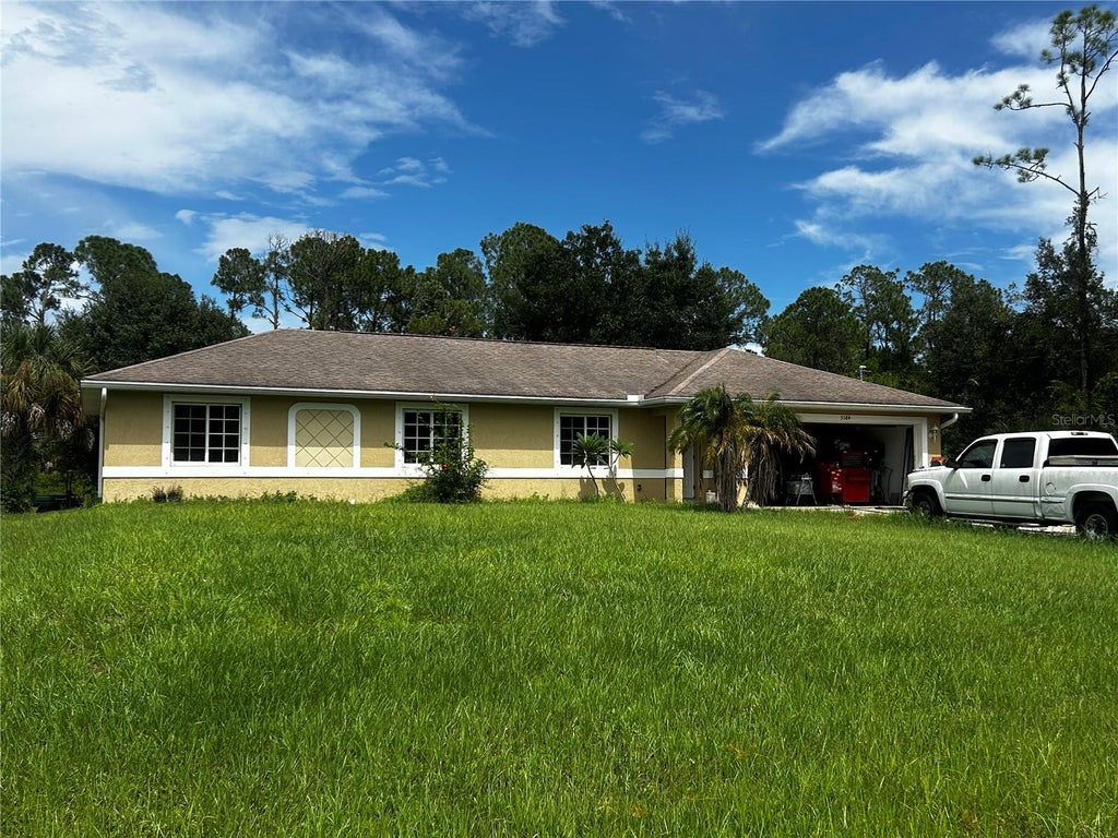 Photo of 5584 Wagon Wheel Drive, North Port, FL 34291 (MLS # C7530080)