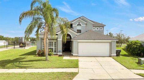 Photo of 535 Downing Circle, Davenport, FL 33897 (MLS # O6356346) Photo of 535 Downing Circle, Davenport, FL 33897 (MLS # O6356346)