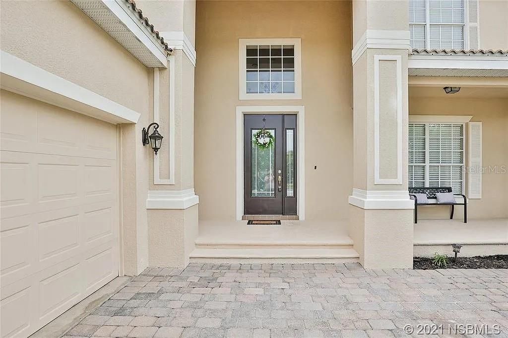 Photo of 453 Venetian Villa Drive, New Smyrna Beach, FL 32168 (MLS # TB8412233)