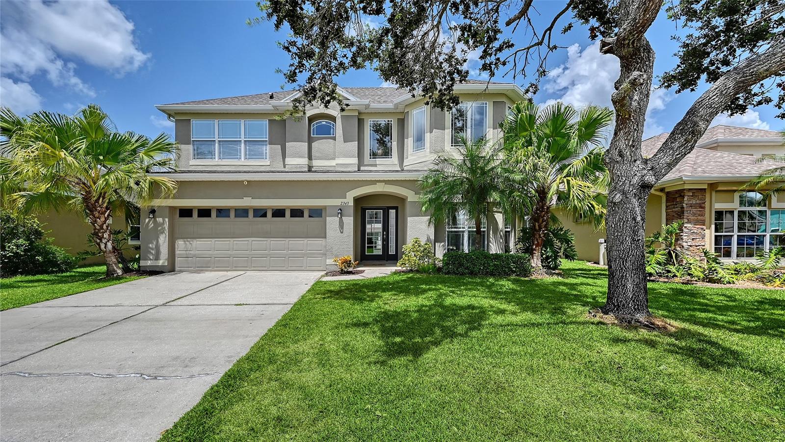 Welcome to your perfect family home; ideally designed with space for everyone and located within walking and biking distance to Williams Elementary! Boasting over 3,200 square feet of living space, this home offers room to grow and gather. With a LOW HOA fee and NO CDD fee, it delivers exceptional value in a highly desirable location. Step inside and be wowed by the soaring 22-foot ceilings and abundant natural light that fills the spacious interior. With a formal dining room, separate living room, and generous family room, this home is thoughtfully laid out for both everyday living and entertaining. The primary suite is conveniently located downstairs, along with a dedicated office or guest room. Upstairs, you’ll find three additional spacious bedrooms, a full bathroom, a flexible loft space, and a massive bonus room with vaulted ceilings, ideal for a game room, media room, playroom, or home gym, giving your family room to grow and play.
The kitchen is both functional and inviting, featuring 42" cabinets, Corian countertops, two pantries, a large breakfast bar, and an eat-in area for casual dining. Step outside to enjoy indoor outdoor living, with views from most rooms overlooking the screened-in pool area and a fully fenced backyard, perfect for privacy, pets, and backyard fun.
This beautifully maintained home offers both comfort and peace of mind, featuring a NEW roof installed in 2023 and an A/C system replaced in 2019. Inside, you’ll find upgraded luxury vinyl flooring in the dining room, living room, and primary bedroom, adding style and durability throughout. Located in the highly desirable River Plantation community, residents enjoy access to fantastic amenities including a resort-style pool, tennis and basketball courts, scenic nature trails, a clubhouse, playground, and a kayak launch where manatee and wildlife sightings are common. Plus, with a public boat ramp just 2 miles away, weekend water adventures are right at your fingertips.
With the nearby Fort Hamer Bridge providing quick access to Lakewood Ranch and surrounding areas, this is more than just a house, it’s the lifestyle your family deserves!