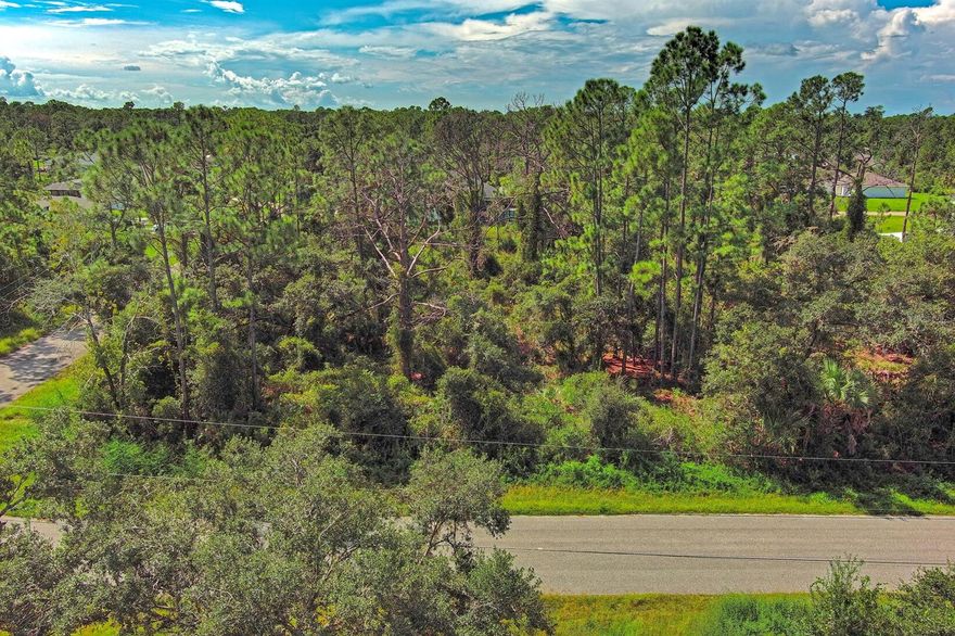 This centrally located 0.28-acre corner lot in North Port, Florida, is high and dry with no flood zone. Conveniently close to I-75 and major roads, it offers the perfect location for your next home. North Port, FL is a rapidly growing city known for its family-friendly atmosphere, proximity to Gulf Coast beaches, and easy access to both Sarasota and Fort Myers. The city also offers a variety of outdoor recreational activities, including hiking, golfing, and access to Warm Mineral Springs.