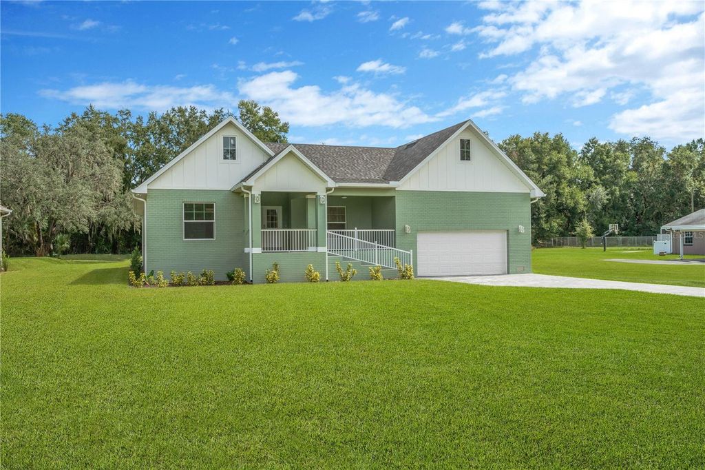 Photo of 12484 Green Oak Lane, Dade City, FL 33525 (MLS # TB8434695)
