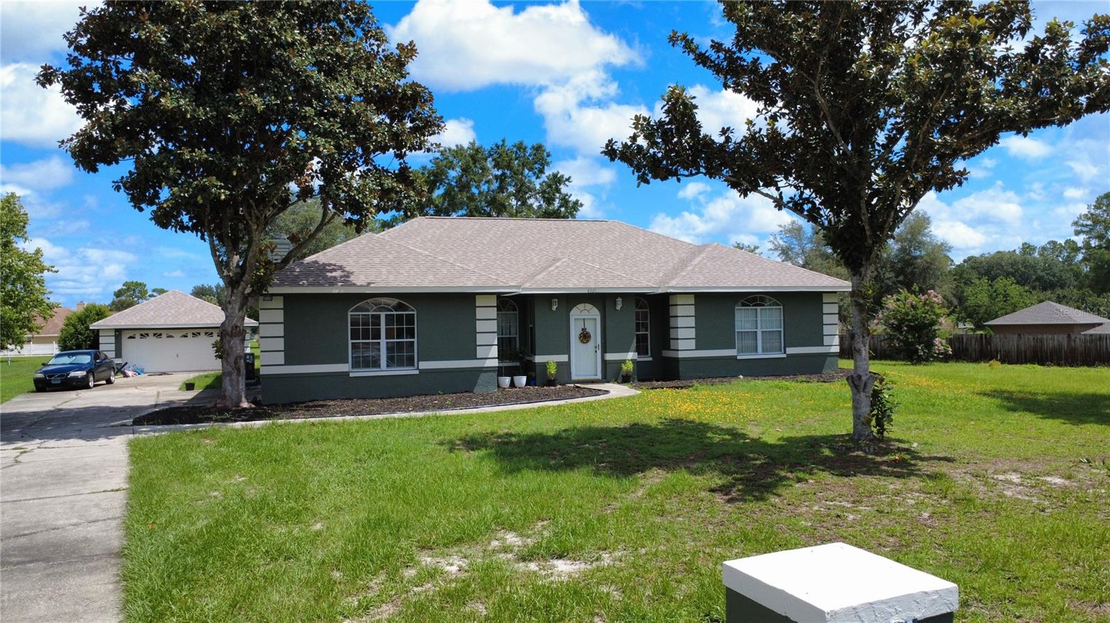 Spacious 3 bedroom 2 bathroom Home located in a beautiful serene gated community minutes from Silver springs state park, Museums, Entertainment and shopping! This home offers almost an acre of yard, a Florida room, formal dining room, large bedrooms detached over sized garage on a quiet Cul de sac. All the major ticket items have been replaced in 2025, New Roof, New Rheem A/C unit, New water heater, Tile floors installed and Freshly painted exterior. Come on by and explore all this beautiful home has to offer!