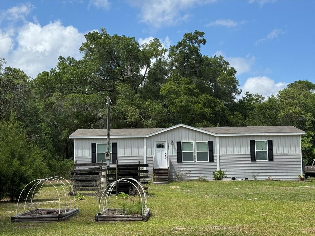 Photo of 10801 SW 160th Street, Dunnellon, FL 34432 (MLS # OM723785)