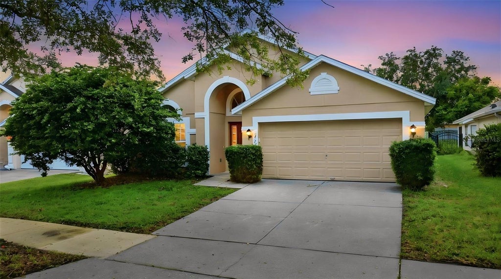 Photo of 5742 Essex Isle Drive, Orlando, FL 32829 (MLS # O6437464)