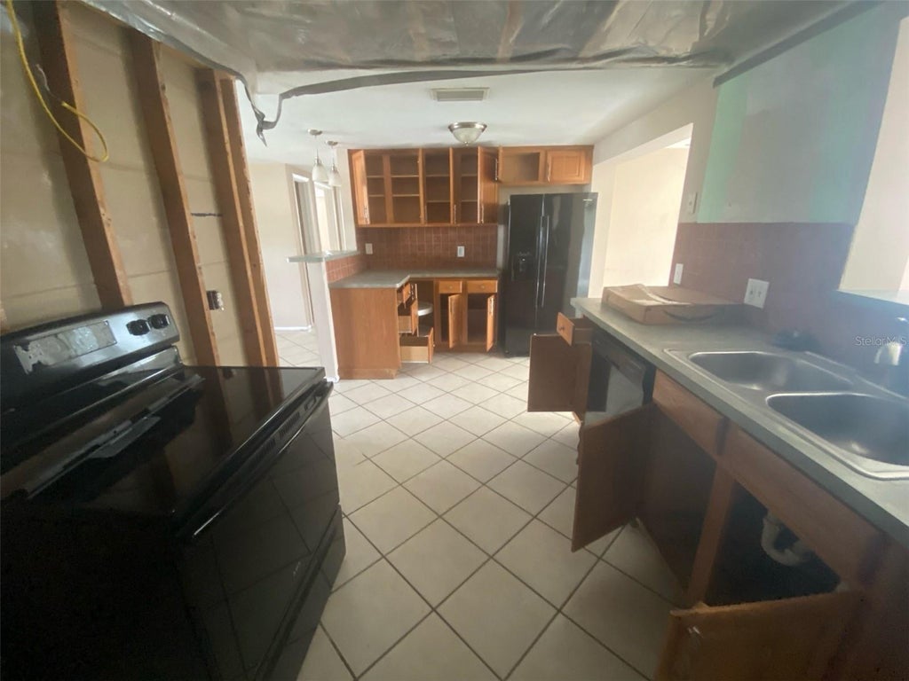 Photo of 7600 Topay Lane, Port Richey, FL 34668 (MLS # O6447670)