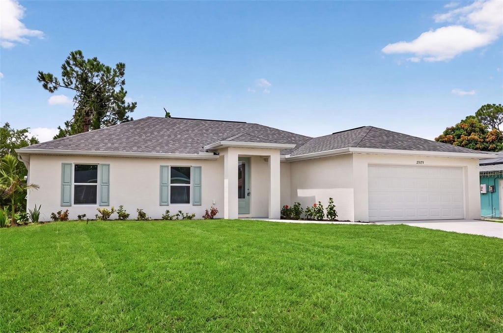 Photo of 23175 Wilkinson Avenue, Port Charlotte, FL 33980 (MLS # TB8529826)
