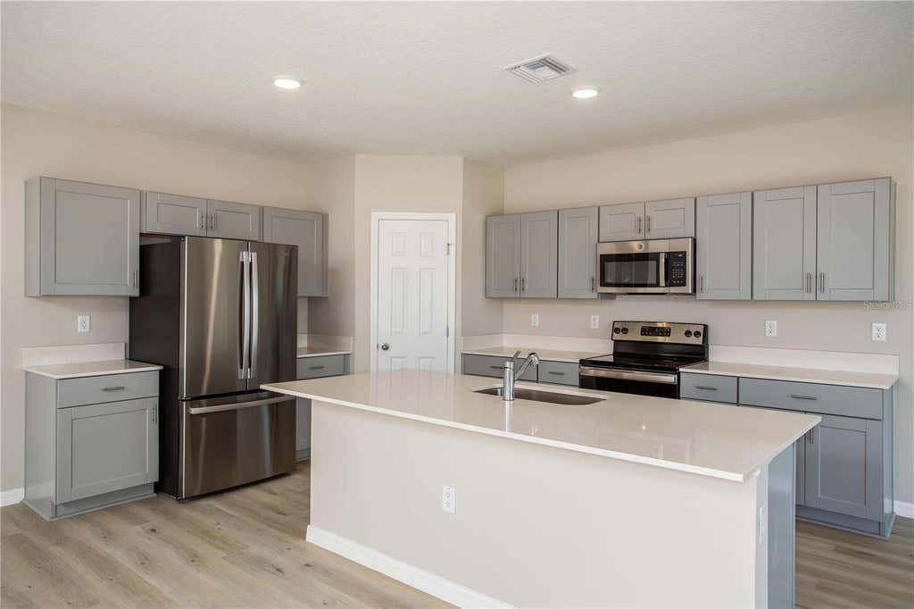 Photo of 5390 San Pietro Drive, Winter Haven, FL 33884 (MLS # TB8535230)
