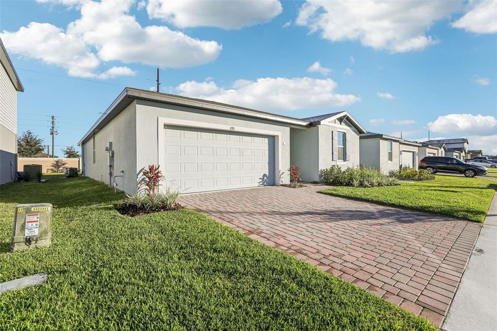 Photo of 891 Sand Sea Place, Haines City, FL 33844 (MLS # O6329213)