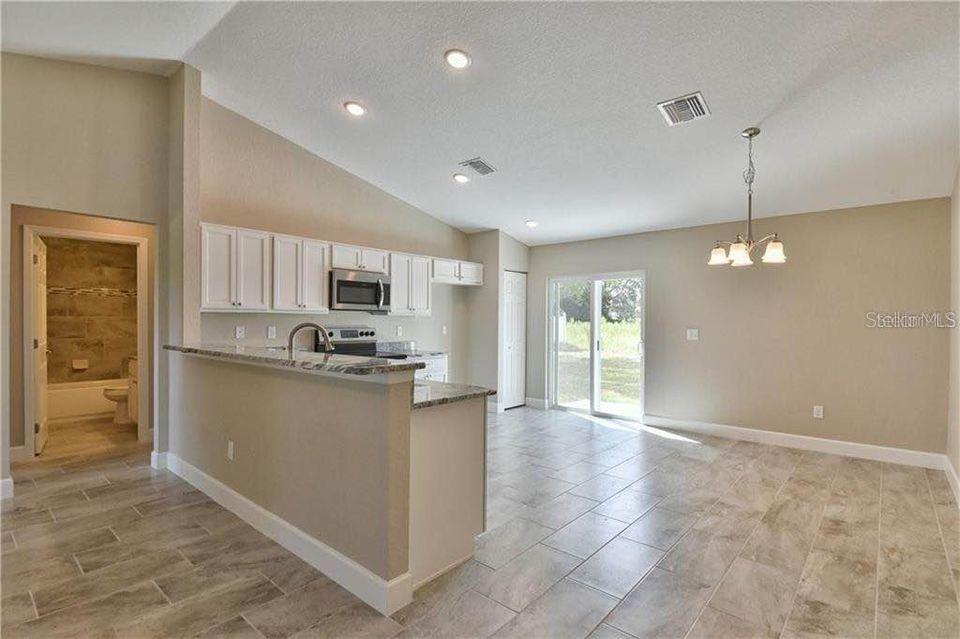 Photo of 6382 SW 143rd Lane Road, Ocala, FL 34473 (MLS # OM731265)