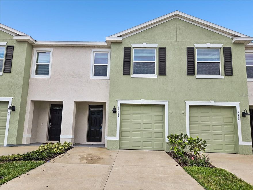 One or more photo(s) has been virtually staged. This newer construction 3-bedroom, 2.5-bath townhome with 1-car garage offers modern comfort in a prime location.  The home features a bright, neutral color palette throughout and an all-tile first floor for easy maintenance. The open layout includes a well-designed kitchen and spacious living area, while the split bedroom plan upstairs provides privacy and functionality. The primary suite features a private bathroom and generous closet space, and there’s an upstairs laundry closet for added convenience.  Located in the desirable Angeline community — home to a growing list of amenities including a produce farm, café, and more coming soon — and with quick access to major highways for easy commutes to Tampa and surrounding areas. Excellent condition and ready for move-in!  Equal Housing Opportunity.