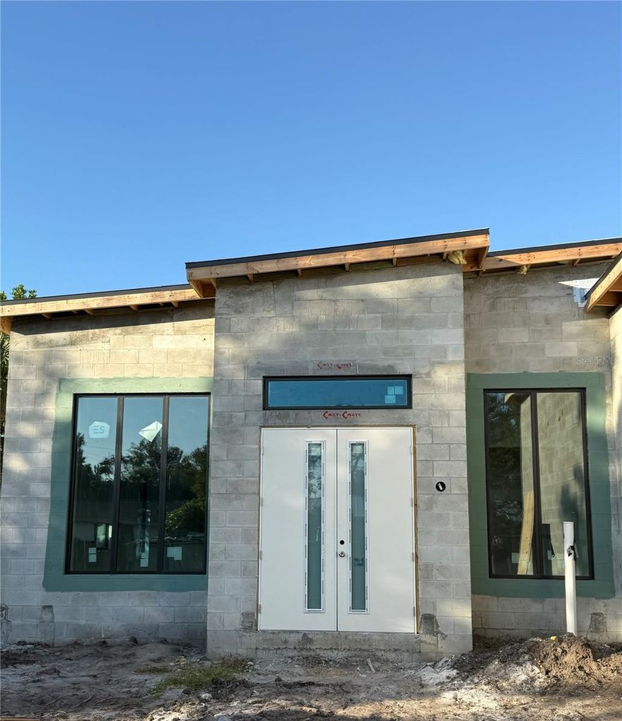 Under Construction. No expense has been spared in the construction of this luxurious new offering in the highly coveted Arlington Park Neighborhood! Featuring a solid block concrete exterior, aluminum impact windows, spray foam insulation, and a TPO roof to ensure your home LASTS; as well as tall ceilings, luxury vinyl plank and handpicked tile flooring, designer wood cabinets, walk-in closets, and premium quartz countertops to ensure that your home lasts…In Style! Of course, the home is also paired with a gunite saltwater lounge pool, as well as professional fencing and landscaping to ensure your privacy. Centrally located a short drive or bike ride away from the restaurants and boutiques of downtown Sarasota, award-winning Siesta Key beaches, and several top-rated golf courses, you will be in the perfect location to take advantage of all the sun-soaked fun that Sarasota has to offer! Construction set to finish in March 2026. Don’t wait! Call and schedule your tour today for an exclusive builder walkthrough! Make every day in paradise count at 2069 Hibiscus!