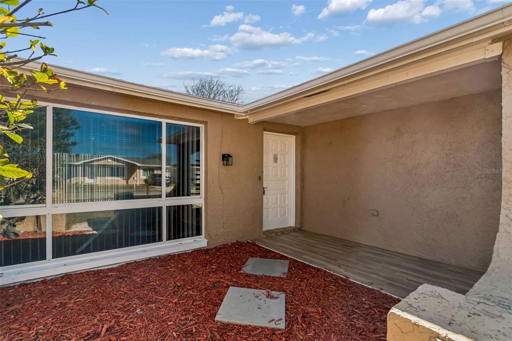 Photo of 10110 Brandywine Lane, Port Richey, FL 34668 (MLS # TB8484007)