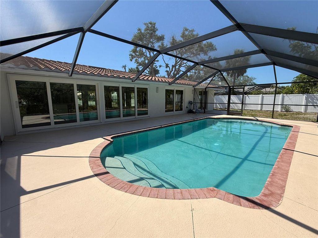 Photo of 5569 Shadow Lawn Drive, Sarasota, FL 34242 (MLS # A4691399)