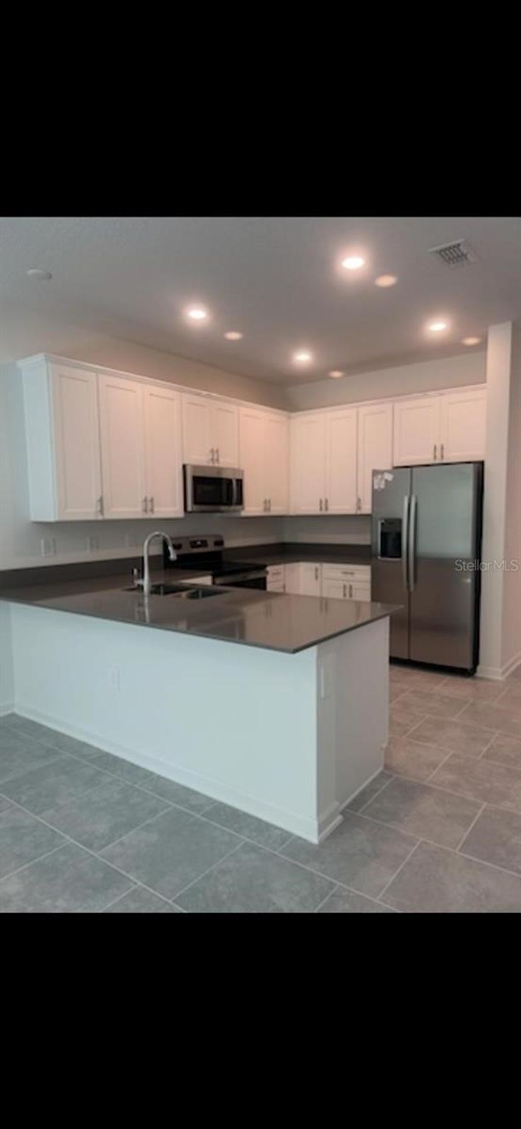 Photo of 7524 Stone Creek Trail, Kissimmee, FL 34747 (MLS # O6406309)