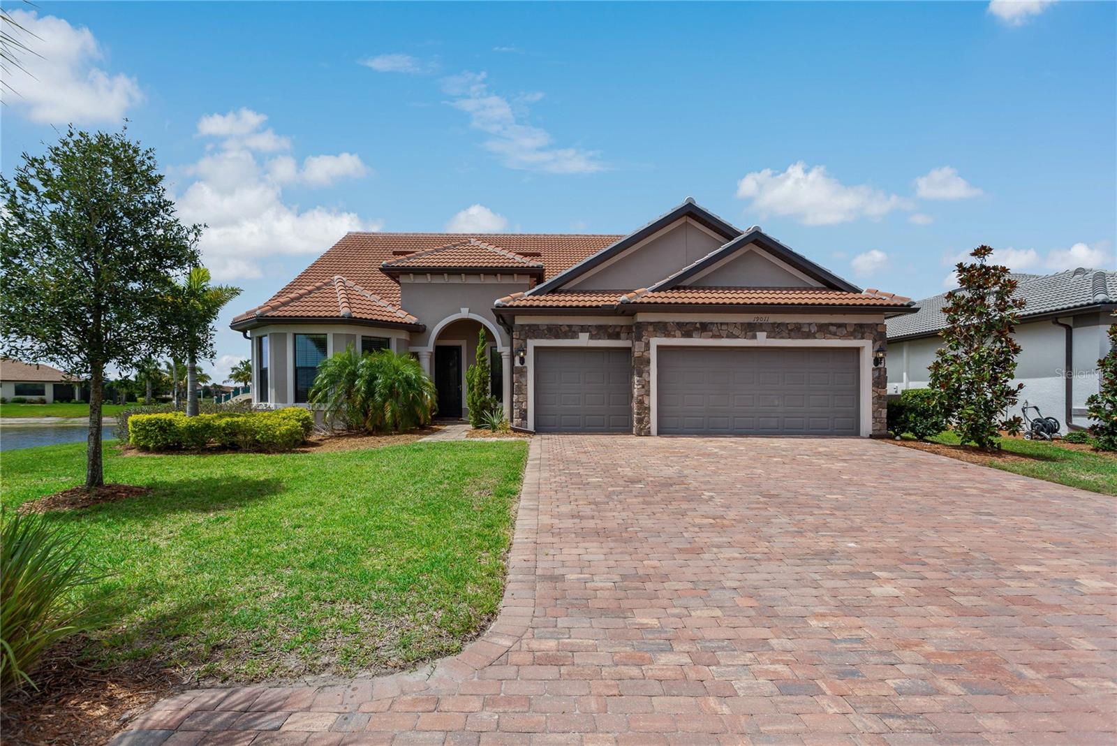 **AVAILABLE STARTING OCTOBER 1, 2025** 6 MONTH MINIMUM LEASE PER COMMUNITY REGULATIONS. Available for an annual rental at $5900/month. For terms of less than 1-year, Off-Season Rates (MAY - OCT) $6100/month. In-Season Rates (NOV - APR): $7000/month.
This FULLY FURNISHED Luxury Rental (with Golf Cart) is available in the sought after, gated community of ISLANDWALK! This ONE-OF-A-KIND property sits on a HAMMERHEAD lot (Water on 2 sides) and offers more than 175 feet of direct waterfront property. The views from just about anywhere in this home are spectacular!
This gorgeous home features over 4500 sq/ft of total living space including 4 full bedrooms, 4 full baths, a separate office, and private pool with spa. This wide-open floorplan features 3 bedrooms and an office on the main level, including a dual master bedroom setup - 2 bedrooms with en-suite bathrooms. The upstairs area features a MASSIVE LOFT AREA, full bedroom, and 4th full bathroom! No expense was spared when this home was built in 2017! Luxury kitchen cabinets and countertops, upgraded tile flooring throughout, bar fridge, and high ceilings just to name a few. Kick back and relax in your oversized screened-in porch area with heated pool and spa! Or jump on the golf cart and head outside to enjoy all that Islandwalk has to offer! Take a stroll on the community walking trail just steps from your backyard, or cruise to the clubhouse to take a swim in the massive resort-style pool, workout in the gym, or take part in one of the countless social activities around the neighborhood!
Islandwalk is a MAINTENANCE FREE community offering RESORT-STYLE living complete with high-end facilities including a resort pool, har-tru tennis courts, boccee, fitness, recreation parks, walking trails, and so much more!! Your rent includes access to all community amenities, full lawn maintenance, pool maintenance, and pest control! It doesn't get any more convenient than this! If you are looking for resort-style living at its absolute finest, look no further!
Conveniently located just a couple of miles off interstate 75 – this ideal location allows EASY access to all that Florida has to offer! Beaches, paddle boarding, boating, fishing, shopping, dining, or just relaxing in the sun.... It’s all here and ready for you! Some of the most sought-after beaches in the country are just a short drive away. Just minutes from shopping, dining, golf, public parks, and beautiful downtown Venice! The vibrant downtown area is nearby or head a little further south to Fisherman’s Village or Ft. Myers and catch the Key West Express to spend a couple of days in the KEYS! Tampa, Sarasota, Siesta Key, Clearwater, and St. Pete are all nearby too!!