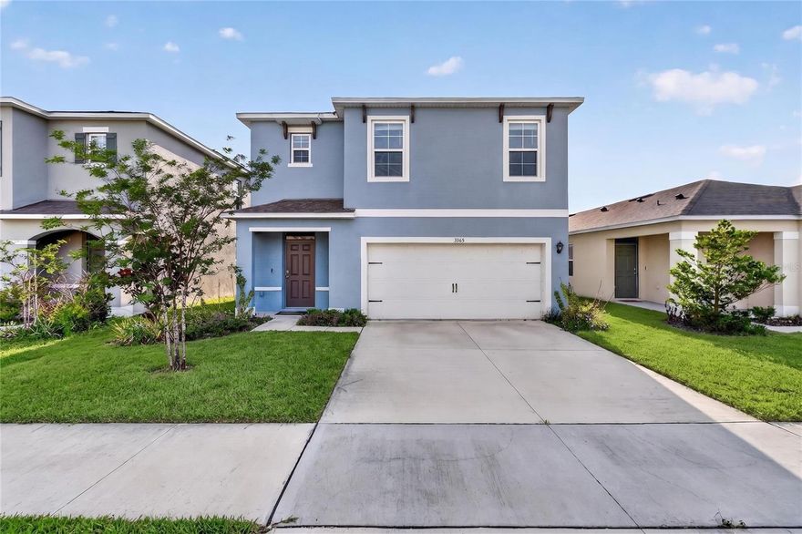 Short Sale. Discover this beautifully designed 2023-built 5-bedroom, 3-bathroom home located in the highly sought-after Villamar community in Winter Haven, Florida. This spacious two-story home offers the perfect blend of modern style, functional living space, and scenic water views. The welcoming foyer opens into a bright and airy open-concept floor plan ideal for both entertaining and everyday living. The chef-inspired kitchen features plentiful gray cabinetry, a large center island, stainless steel appliances, and an oversized pantry, all overlooking the spacious living room for seamless gathering and conversation. A downstairs bedroom and full bathroom provide the perfect setup for guests, multi-generational living, or a home office.
Upstairs, you’ll find a versatile loft space that can be used as a second living area, playroom, media room, or workspace. The spacious primary suite offers a large walk-in closet and private en-suite bathroom complete with double vanities and a walk-in shower. Three additional upstairs bedrooms, another full bathroom, and a convenient upstairs laundry room provide plenty of room for everyone. Step outside and enjoy peaceful water views right from your backyard.
Located in the growing Villamar community, residents enjoy amenities including a community pool, clubhouse, playground, and low HOA fees. Conveniently situated near US-27 and I-4, this home provides easy access to shopping, dining, medical facilities, and entertainment. Nearby attractions include the LEGOLAND Florida Resort, the Winter Haven Chain of Lakes, and the Downtown Winter Haven Historic District. This is a fantastic opportunity to own a newer construction home with water views in one of Winter Haven’s fastest-growing communities. Short sale opportunity — don’t miss your chance to make this home yours!