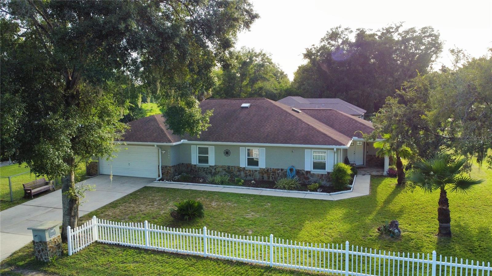 Don’t miss this beautifully upgraded 4-bedroom, 2-bathroom pool home located on a spacious 3,850 sqft corner lot in one of Ocala’s most desirable neighborhoods. This home offers a large open-concept living room filled with natural light, modern tile flooring throughout (no carpet), and ceiling fans with built-in lighting. The fully equipped kitchen includes brand-new appliances and a convenient bar area, perfect for casual entertaining. The home also comes with a mounted TV, premium sound system, and a full security camera setup for added peace of mind. Outside, you’ll find a screened-in private pool with a covered lanai, ideal for relaxing or hosting guests, plus an additional outdoor shed for extra storage. The two-car garage and extended driveway provide plenty of parking space. Conveniently located near to Jervey Gant Park, shopping centers, and restaurants. Zoned for top-rated schools including Maplewood Elementary, Osceola Middle, and Forest High School. This move-in ready home combines comfort, style, and location — schedule your private showing today!